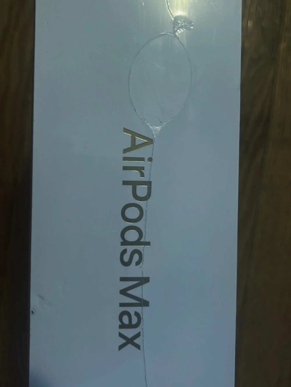 Tan AirPod maxes